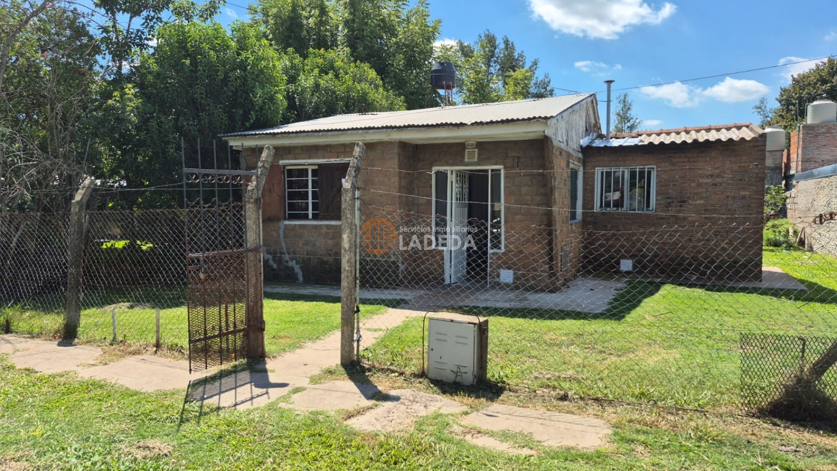 OPORTUNIDAD LOTE CON TODOS LOS SERVICIOS EN FUNES - MAS CASA PREFABRICADA