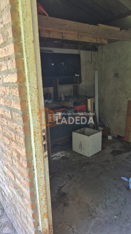 OPORTUNIDAD LOTE CON TODOS LOS SERVICIOS EN FUNES - MAS CASA PREFABRICADA