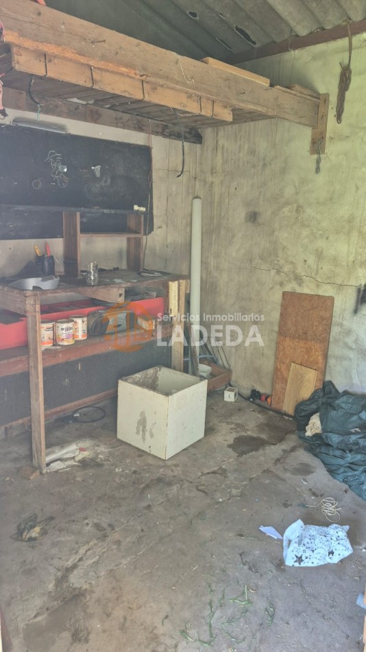 OPORTUNIDAD LOTE CON TODOS LOS SERVICIOS EN FUNES - MAS CASA PREFABRICADA