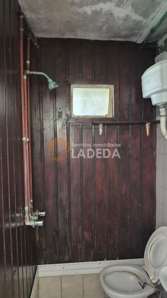 OPORTUNIDAD LOTE CON TODOS LOS SERVICIOS EN FUNES - MAS CASA PREFABRICADA