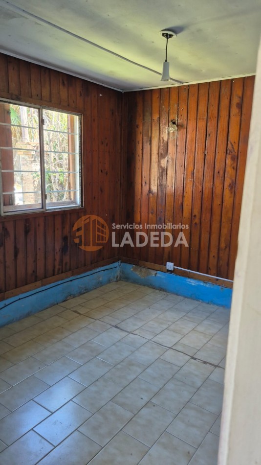 OPORTUNIDAD LOTE CON TODOS LOS SERVICIOS EN FUNES - MAS CASA PREFABRICADA