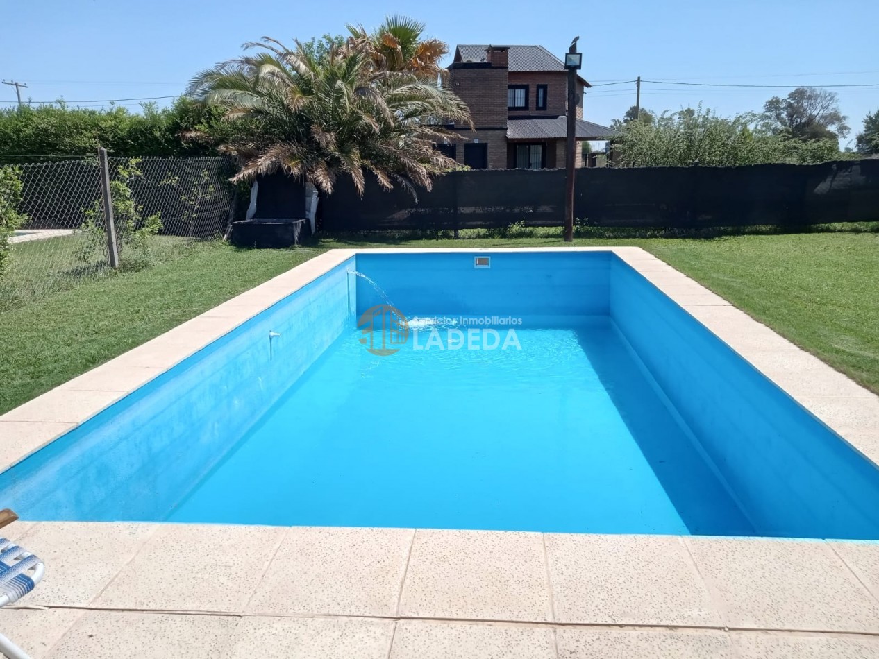 CASA CON PILETA - HERMOSO PARQUE EN PUNTA CHACRA - ROLDAN