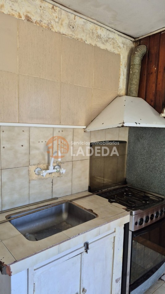 OPORTUNIDAD LOTE CON TODOS LOS SERVICIOS EN FUNES - MAS CASA PREFABRICADA