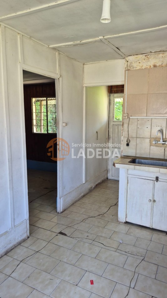 OPORTUNIDAD LOTE CON TODOS LOS SERVICIOS EN FUNES - MAS CASA PREFABRICADA