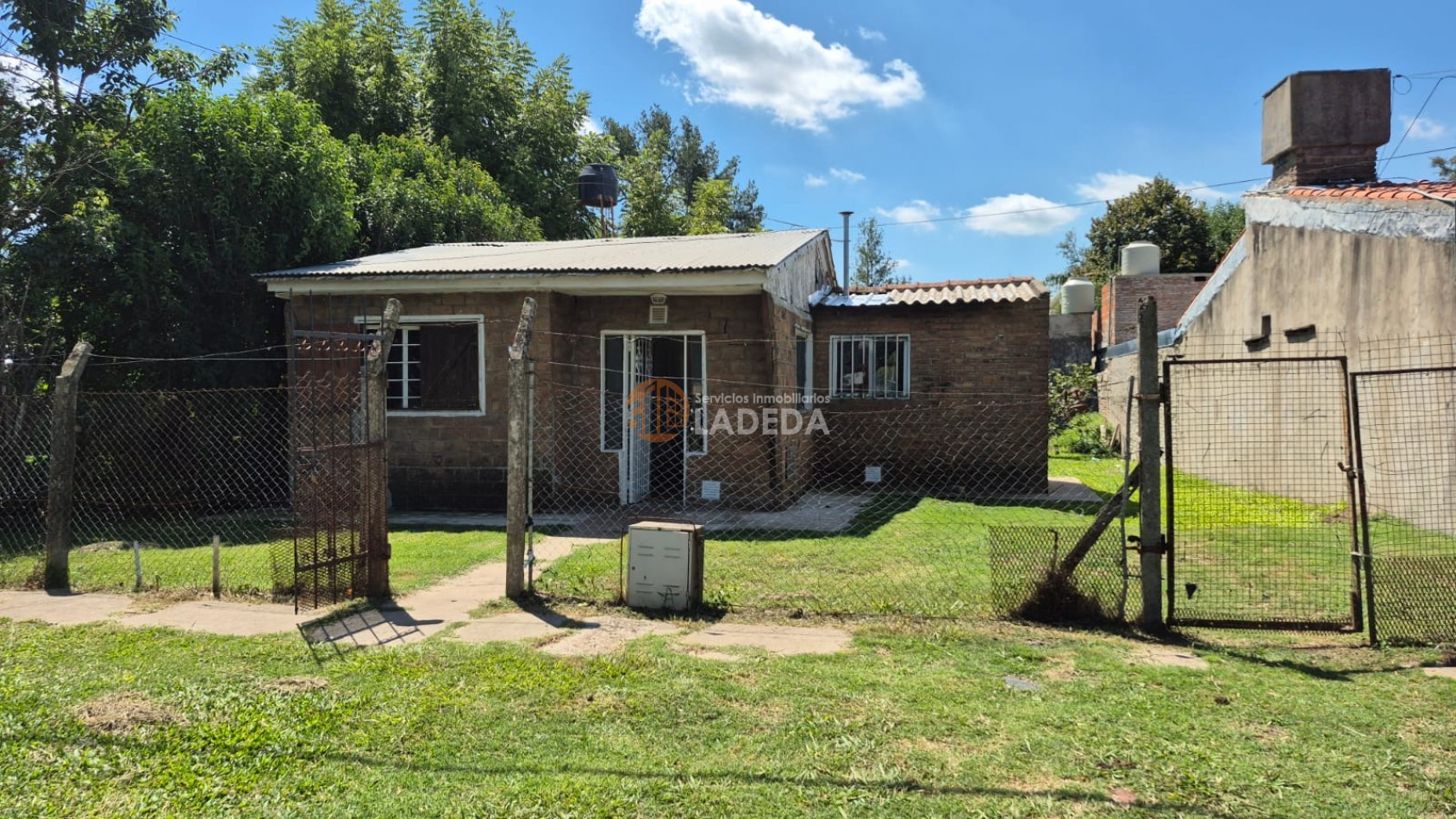 OPORTUNIDAD LOTE CON TODOS LOS SERVICIOS EN FUNES - MAS CASA PREFABRICADA