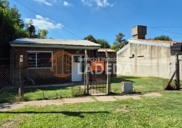 OPORTUNIDAD LOTE CON TODOS LOS SERVICIOS EN FUNES - MAS CASA PREFABRICADA